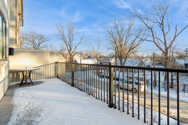 view of snow covered deck