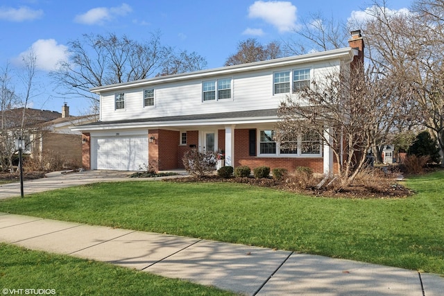 front facade with a front lawn and a garage