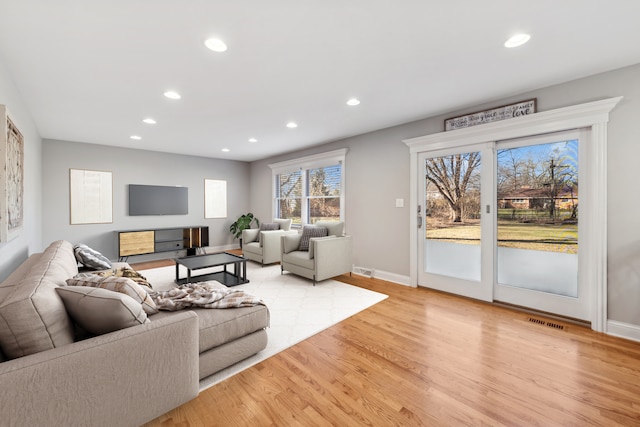 living room with light wood-type flooring