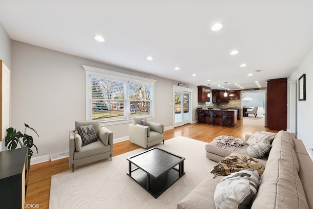 living room featuring light wood-type flooring