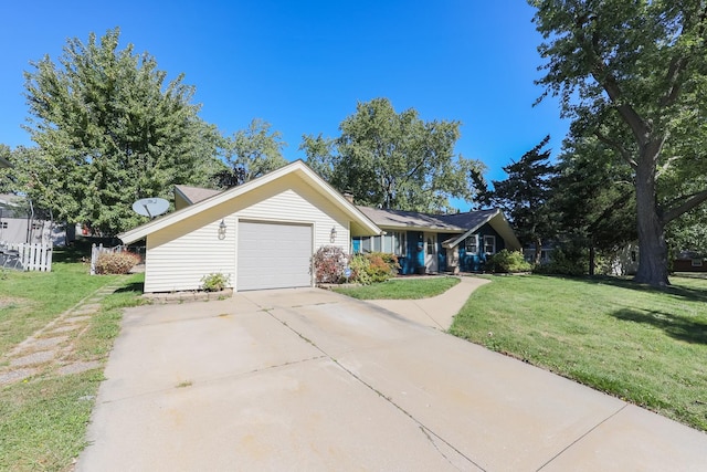 single story home featuring a front yard and a garage