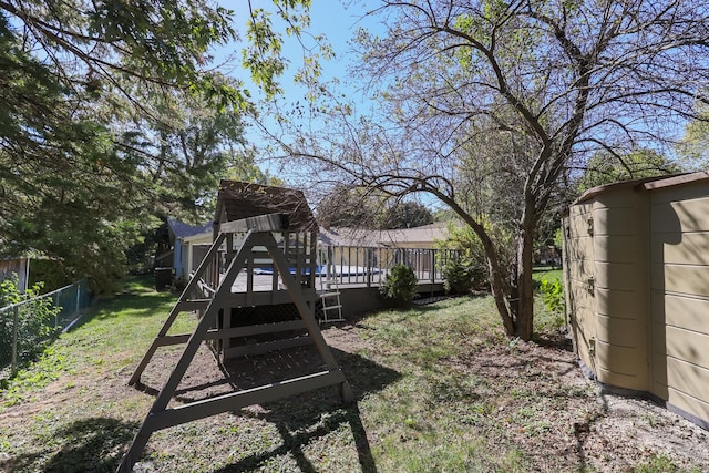 view of yard featuring a wooden deck