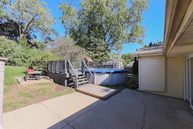 view of patio with a swimming pool side deck