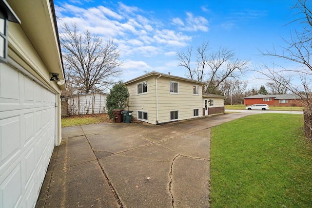 view of home's exterior featuring a lawn