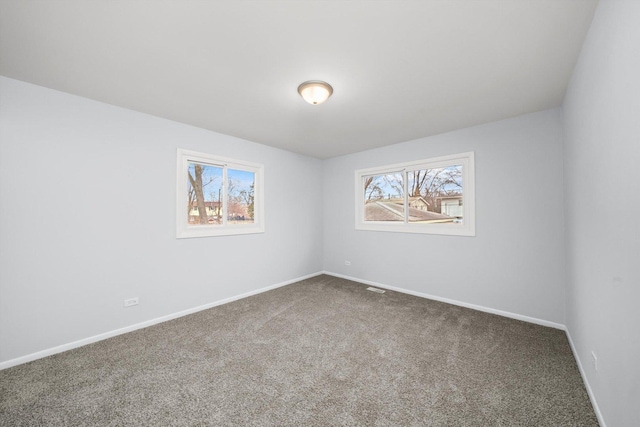 unfurnished room featuring carpet floors