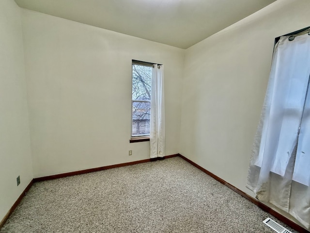 view of carpeted spare room