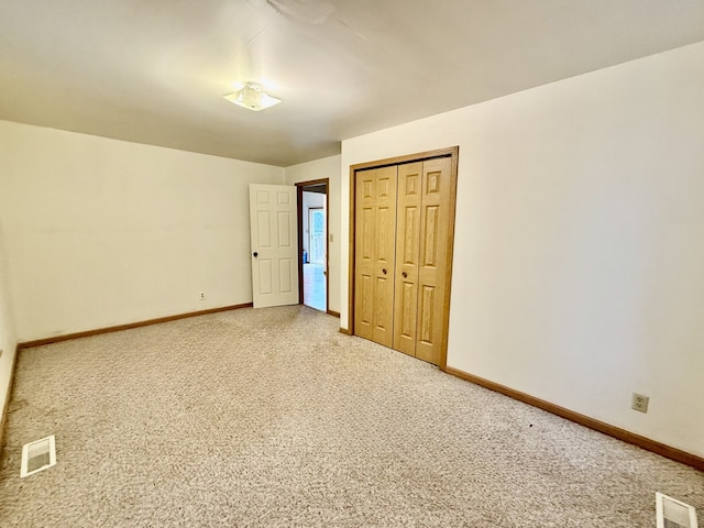 unfurnished bedroom with a closet