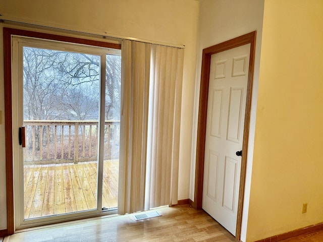 entryway with light wood-type flooring