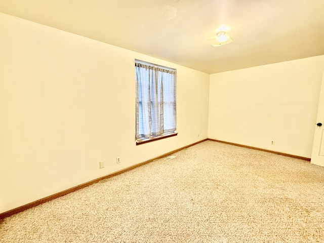 empty room featuring carpet