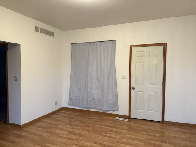 unfurnished bedroom with light hardwood / wood-style floors