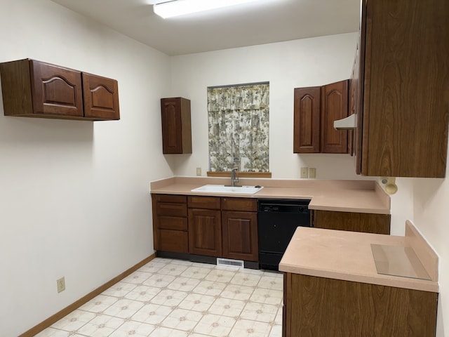 kitchen with dark brown cabinets, black dishwasher, and sink