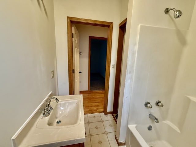 bathroom featuring sink and shower / bathing tub combination