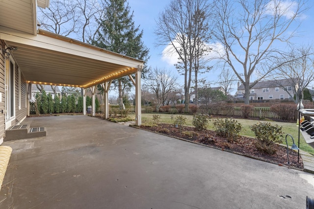 view of patio featuring a carport