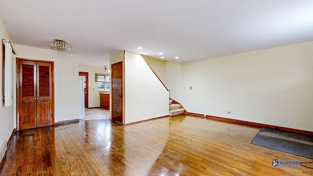 spare room featuring hardwood / wood-style floors