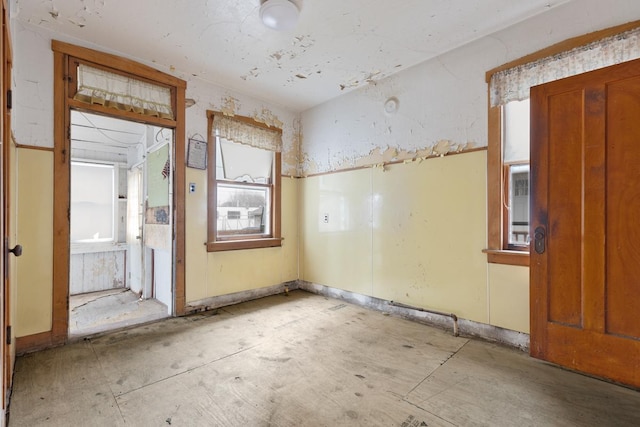 spare room with a wealth of natural light