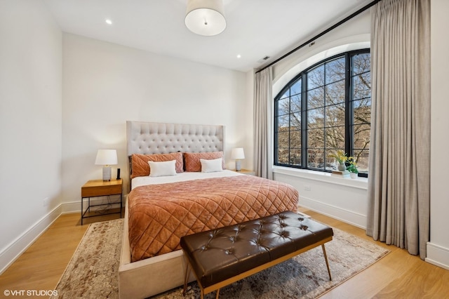 bedroom featuring light hardwood / wood-style flooring