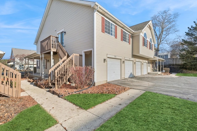 view of side of property with a garage