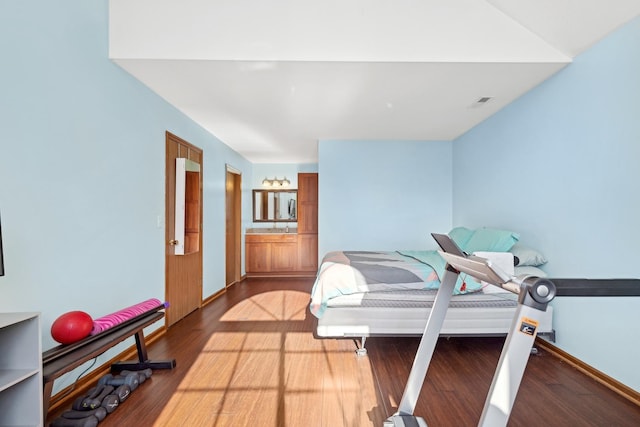 bedroom featuring hardwood / wood-style floors