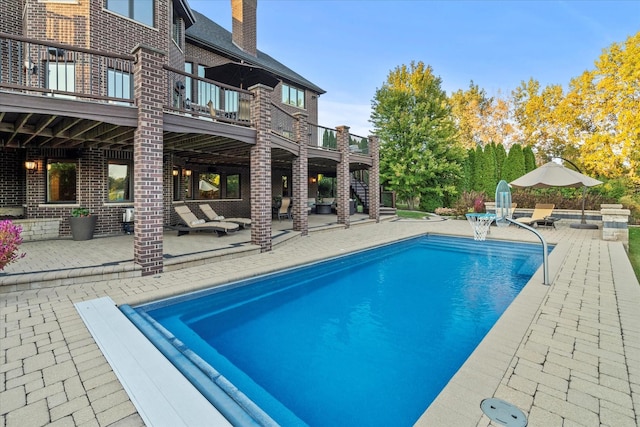 view of pool with a patio area