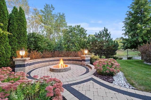 view of patio featuring a fire pit