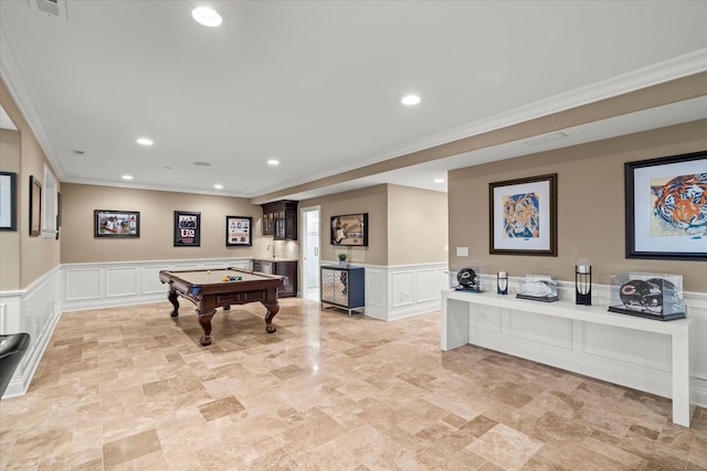 playroom featuring bar area, pool table, and ornamental molding