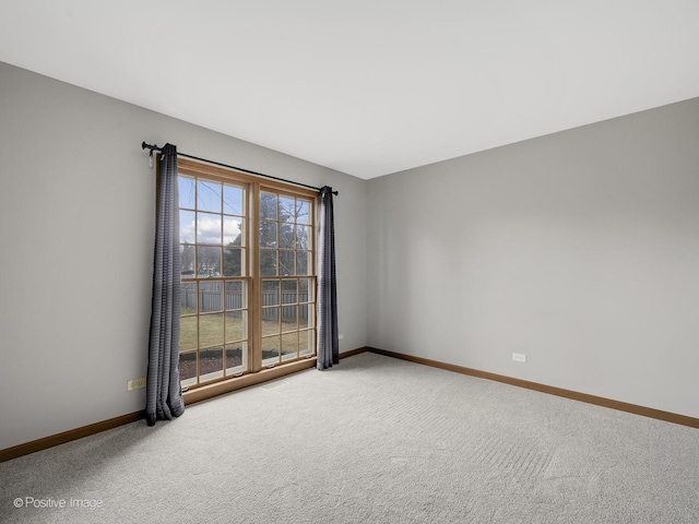 empty room featuring carpet floors