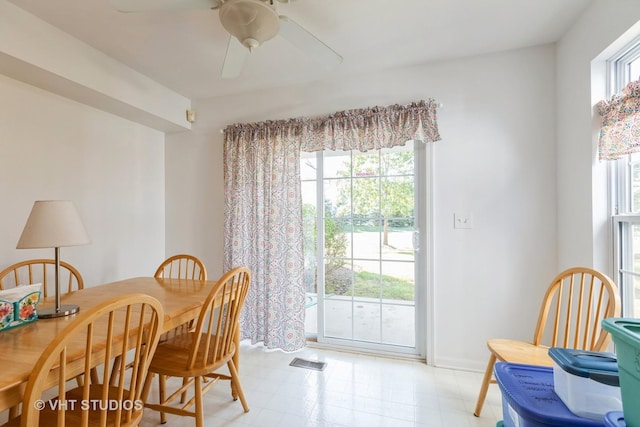 dining room featuring ceiling fan