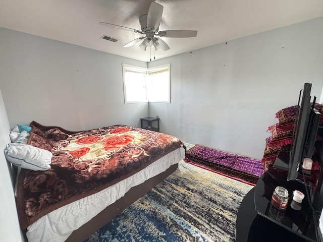 bedroom featuring ceiling fan