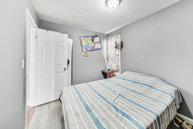 bedroom featuring light wood-type flooring