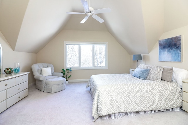 carpeted bedroom featuring ceiling fan and lofted ceiling