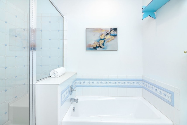 bathroom featuring a tub