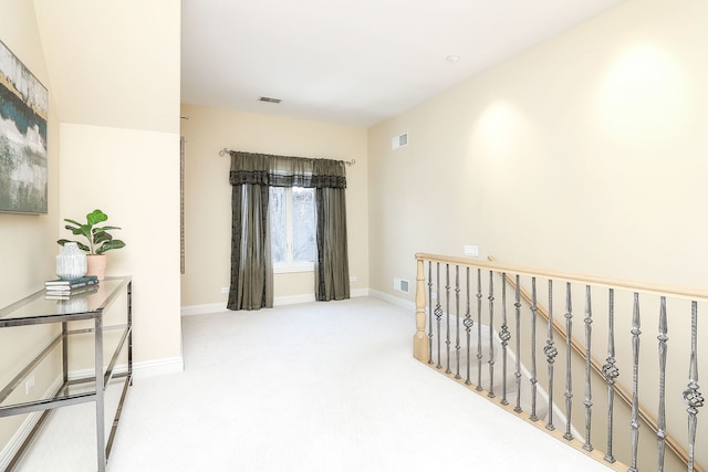 hallway featuring carpet floors