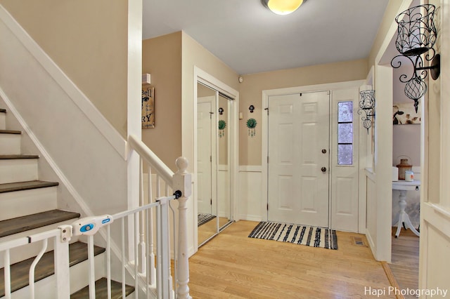 entryway with light hardwood / wood-style floors