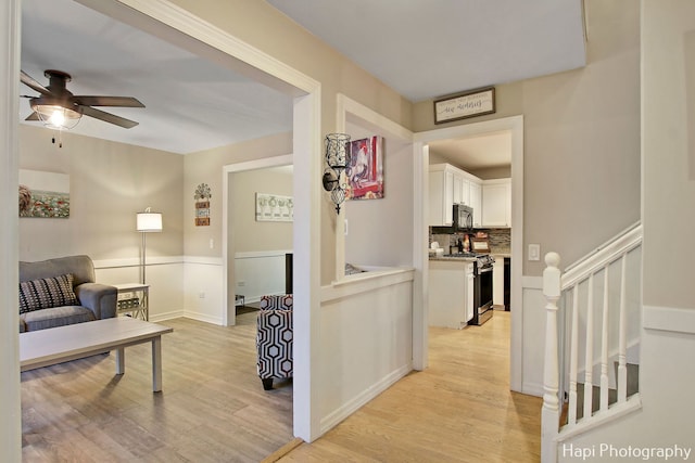 corridor featuring light hardwood / wood-style floors