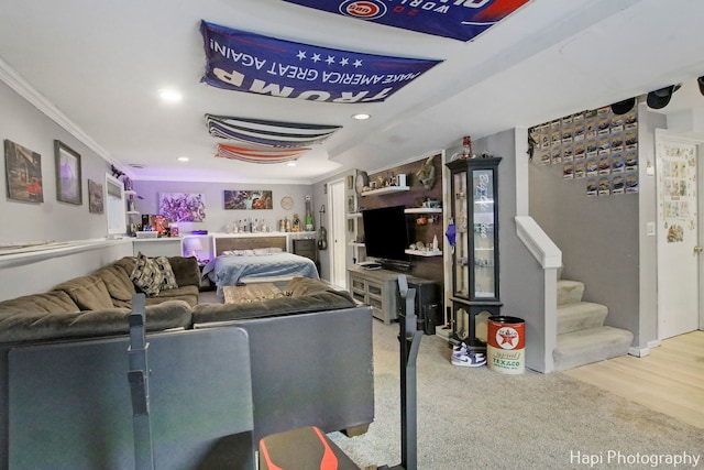 carpeted living room featuring ornamental molding