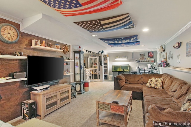 carpeted living room featuring crown molding