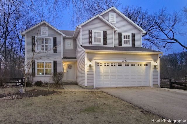 view of property featuring a garage