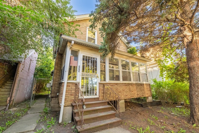 exterior space with a sunroom