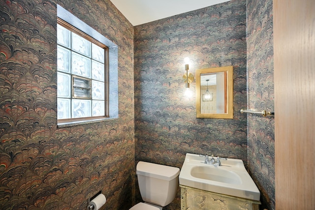 bathroom featuring sink and toilet