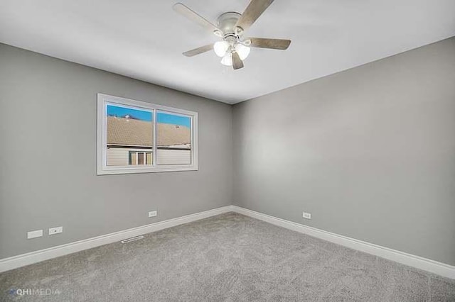 unfurnished room with carpet and ceiling fan