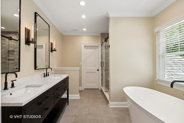 bathroom with vanity, crown molding, and plus walk in shower