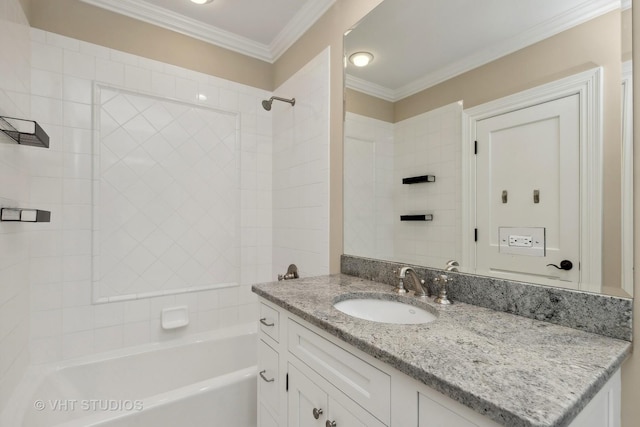 bathroom featuring washtub / shower combination, crown molding, and vanity