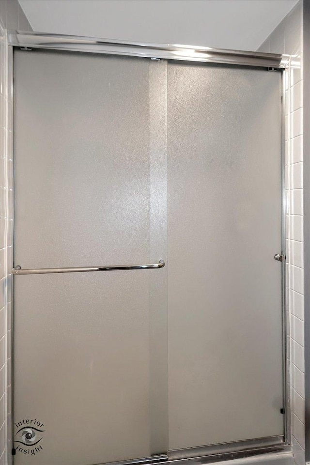 bathroom featuring walk in shower