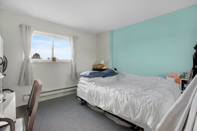 carpeted bedroom with baseboard heating