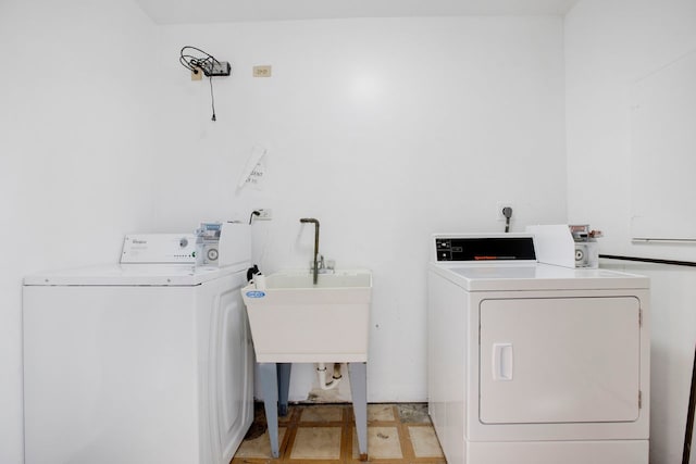 laundry area featuring separate washer and dryer