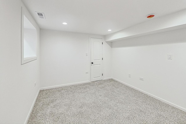 basement featuring carpet flooring