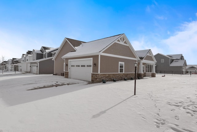 view of side of home featuring a garage