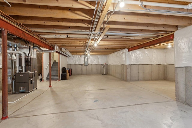 basement featuring heating unit