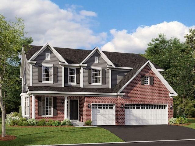 view of front of home featuring a garage and a front lawn