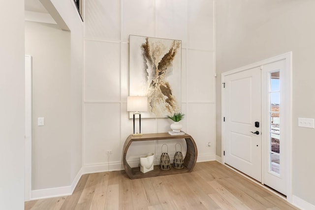 entrance foyer featuring light wood-type flooring